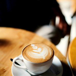 Espresso cup with golden crema in warm light