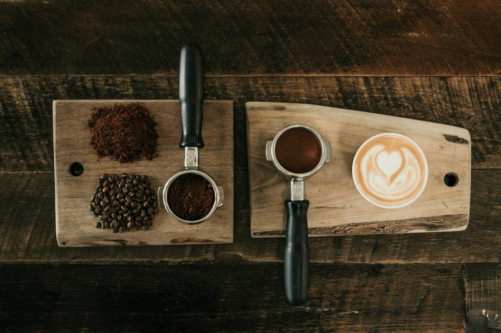 Coffee cupping table with bowls, spoons and roasted beans