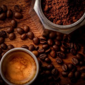 Huila Pink Bourbon coffee grounds, beans and a fresh espresso